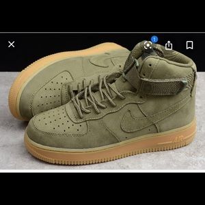 Olive green Nike’s.